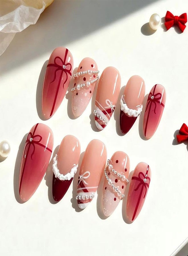 LRKNNO 30Pcs Christmas French Tip Press on Nails Medium Almond Fake Nails Nude Pink Glossy Glue on Nail with Pearl Rhinestone Red Bow Ribbon Designs Reusable Winter False Nail Xmas Acrylic Nails for Women - Image 2